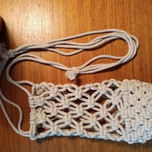 Porte bouteille en macramé